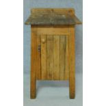 A 19th century country pine food cupboard of planked tapering construction. H.94 W.45 D54cm