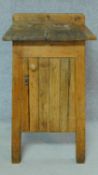 A 19th century country pine food cupboard of planked tapering construction. H.94 W.45 D54cm