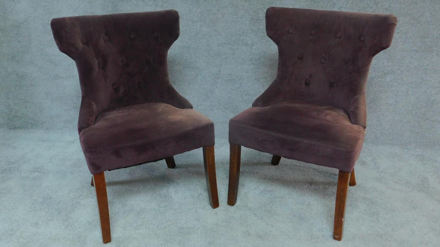 A pair of buttoned upholstered unicorn style tub side chairs. H.89cm