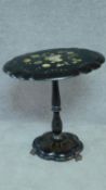 A late Victorian papier mache and mother of pearl inlaid shaped top occasional table on pedestal