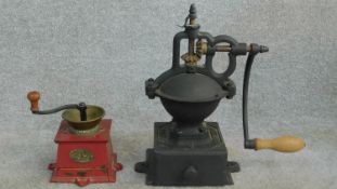 Two antique coffee grinders, one by E. PUGH & Co., Wednesbury, red heavy cast iron with makers