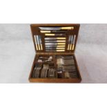 A complete cased set of silver plated cutlery by A. E. Poston & Co, Lonsdale, Sheffield. In oak case