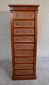 A mahogany secretaire Wellington chest with locking stile and fitted central drawer. H.160 x 52cm