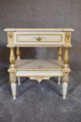 A pair of cream and gilt bedside tables fitted frieze drawer and turned and ornately carved legs