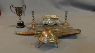 A collection of silver plate including jewellery box, trophy cup, fish slice, handled tray, and