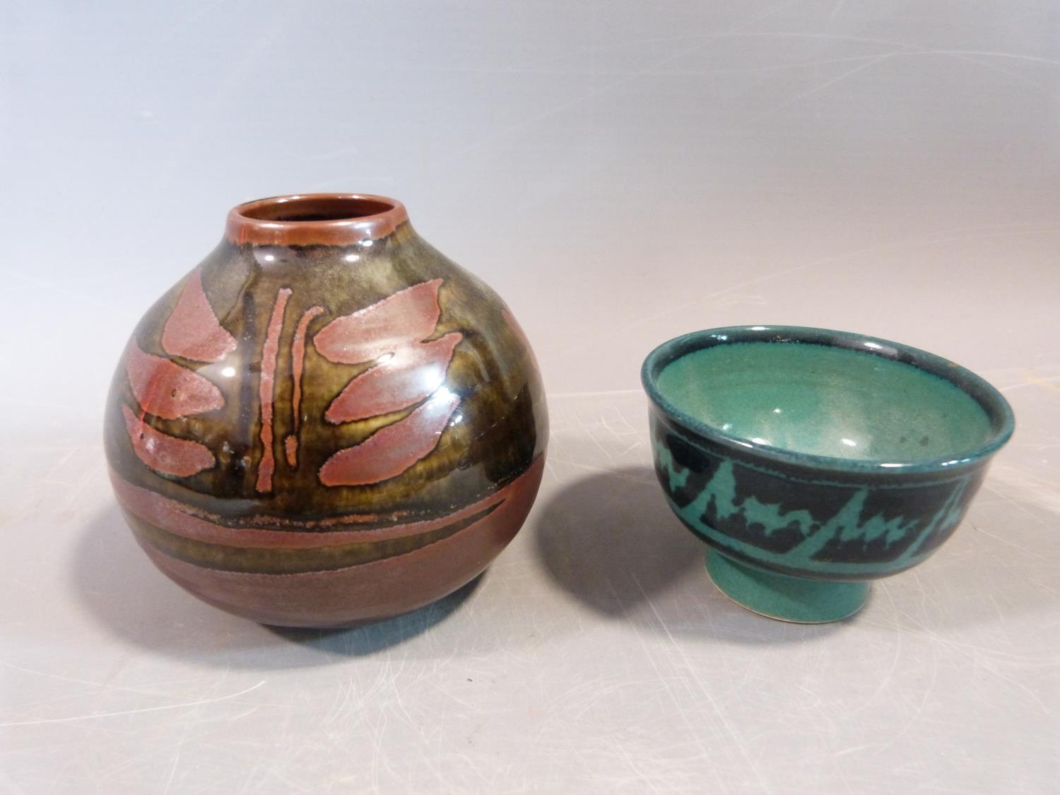 A pair of studio pottery pieces by David Lloyd Jones. The vase with an abstract stylised foliate