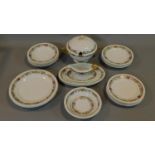A porcelain dinner set by Thomas Bavaria, with floral and gilded design, stamped to base with the