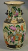 A porcelain Famille Rose crackled glaze handpainted Chinese vase with warriors. Chinese seal to