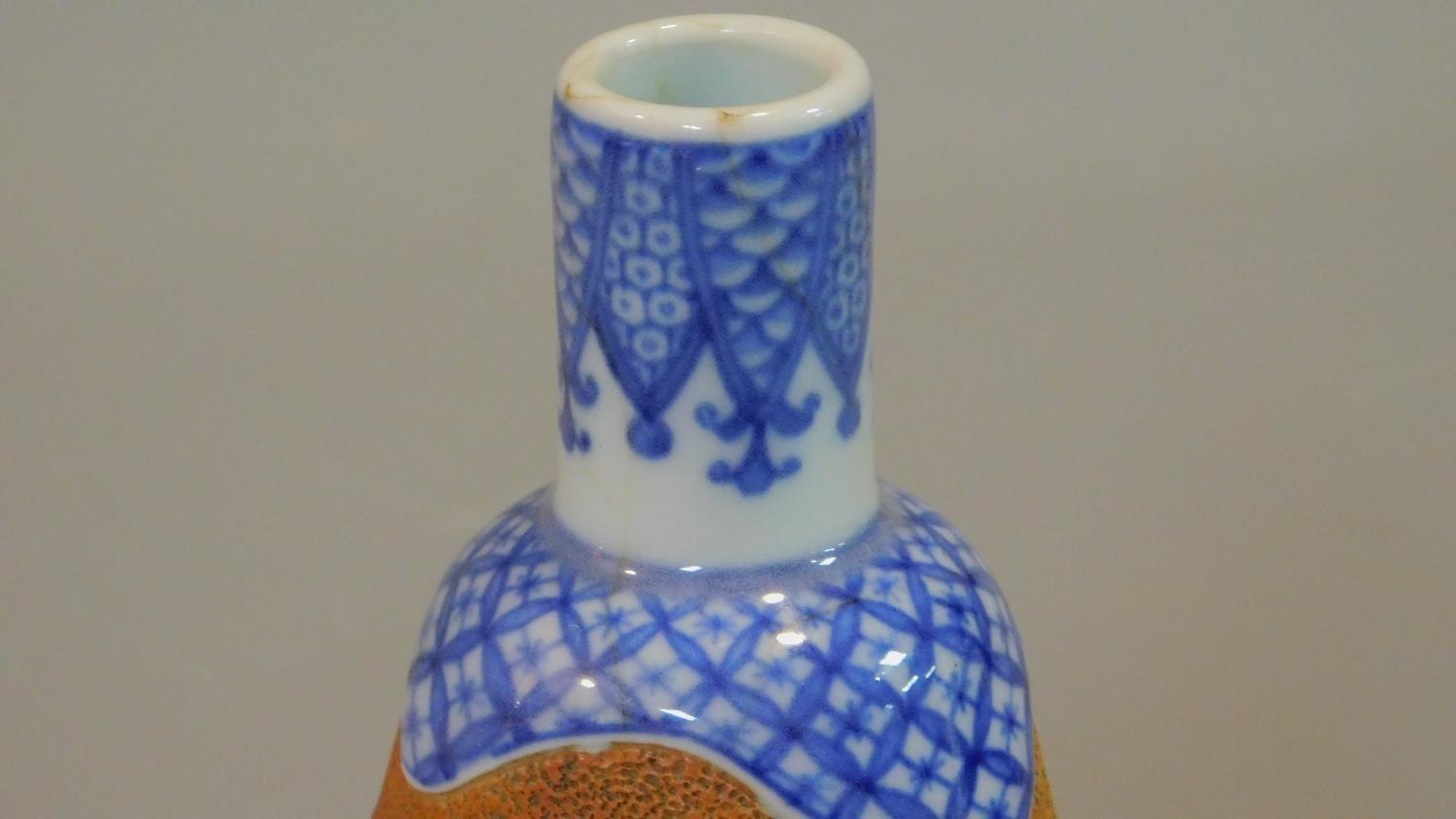 A Chinese ceramic vase and cut glass decanter. Vase with blue and white decoration of birds among - Image 3 of 7