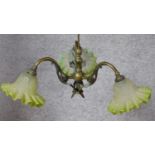 A brass three branch chandelier with belle epoque style glass shades. H.25 W.50cm