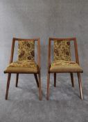A pair of 1950's vintage beech framed dining chairs in floral tapestry upholstery. H. 80 x 45cm