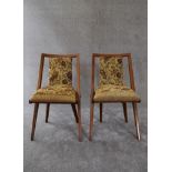 A pair of 1950's vintage beech framed dining chairs in floral tapestry upholstery. H. 80 x 45cm