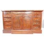 A late 19th century Georgian style breakfront sideboard with rosewood crossbanded top fitted central