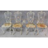 A set of four metal garden chairs (to include one armchair). H.94cm