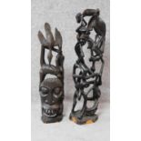 An African carving of stylised figural form and another similar. From Tanzania. H.66cm