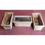 A set of three terracotta rectangular garden planters. H.35 W.72 D.36cm