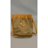A vintage 80's tan leather and Gucci Canvas drawstring bucket bag with red and green striped