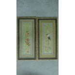 Two framed Chinese silk embroidery panels depicting birds and flowers with a Chinese pattern border.