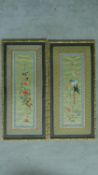Two framed Chinese silk embroidery panels depicting birds and flowers with a Chinese pattern border.