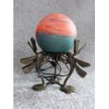 An Art Deco brass dragonfly lamp with orange and turquoise marbled blown frosted glass globe