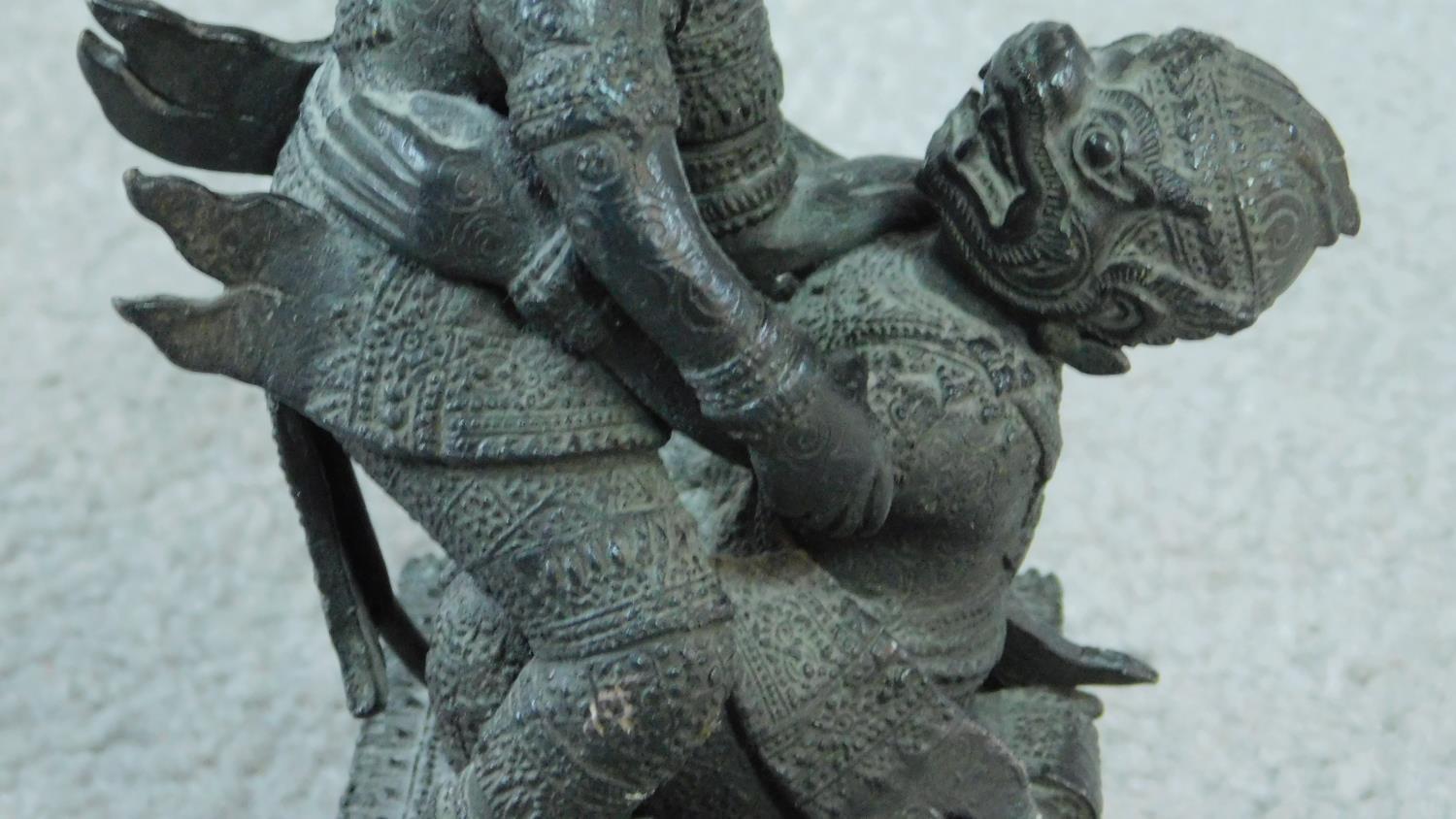 A Thai bronze statue of two Thai monkey gods fighting on a abstract design pedestal base. - Image 4 of 5