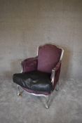 A distressed silver framed Louis XV style fauteuil in purple damask and contrasting faux crocodile