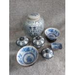 A collection of oriental ceramics. Including a ginger jar, two bowls on stands and three lidded pots