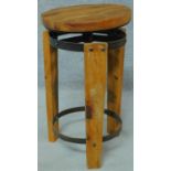 An adjustable industrial style stool. H.57cm