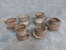 A studio pottery glazed tea set. Tallest 12.5cm