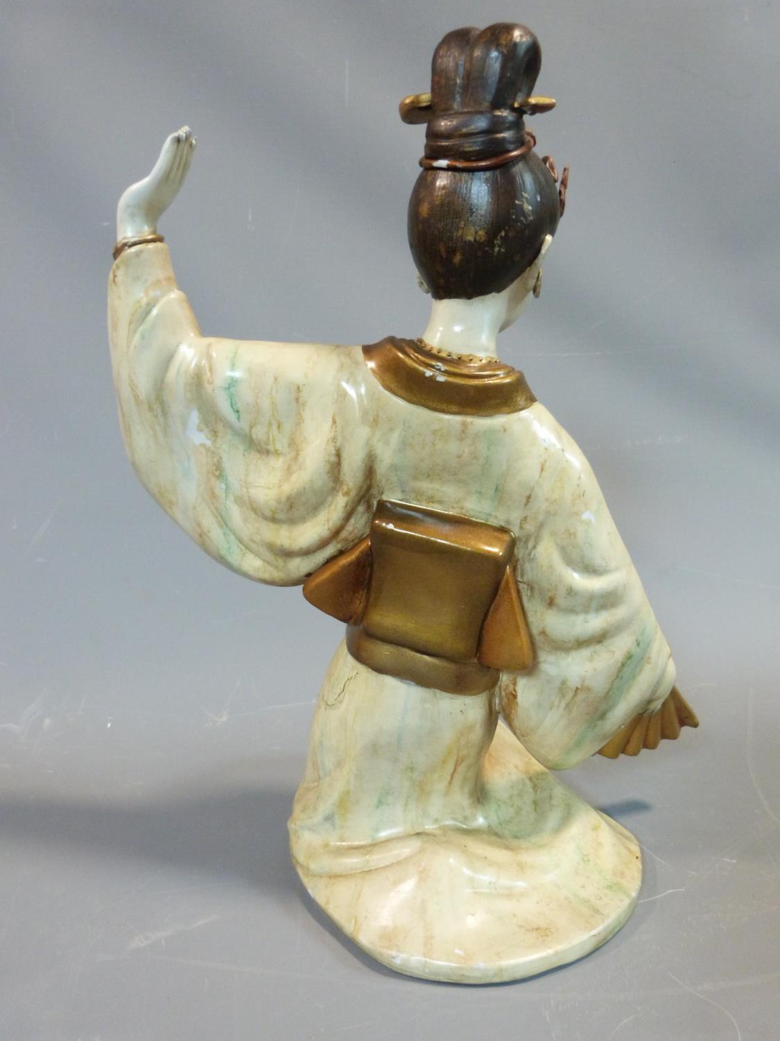 A ceramic figure of a Geisha girl, with fan and flowers in her hair. Gilded decoration. H.45cm. - Image 2 of 7