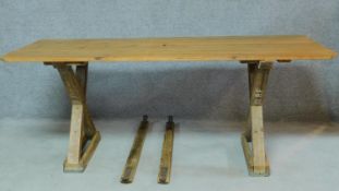 A pine refectory style dining table on X frame supports. H.79 W.196 D.78cm