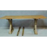 A pine refectory style dining table on X frame supports. H.79 W.196 D.78cm