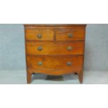 A 19th century mahogany bowfronted chest of two short over three long drawers on bracket feet. H.