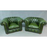 A pair of Chesterfield armchairs in buttoned green leather upholstery. H.76 W.110 D.96cm