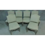 A set of six French provincial style oak framed dining chairs in calico upholstery. H.95cm