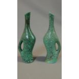 A pair of ceramic turquoise glazed jugs. Marked to the bottom CAR. H.35cm