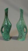 A pair of ceramic turquoise glazed jugs. Marked to the bottom CAR. H.35cm