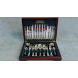 A wooden cased canteen of silver plated cutlery by Elkington and Co of Sheffield. W.41 D.30cm