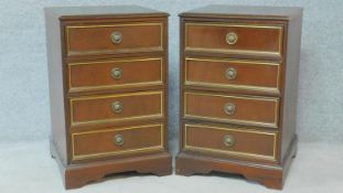 A pair of Georgian style mahogany bedside chests with brass strung drawers. H.71 W.45 D.45cm