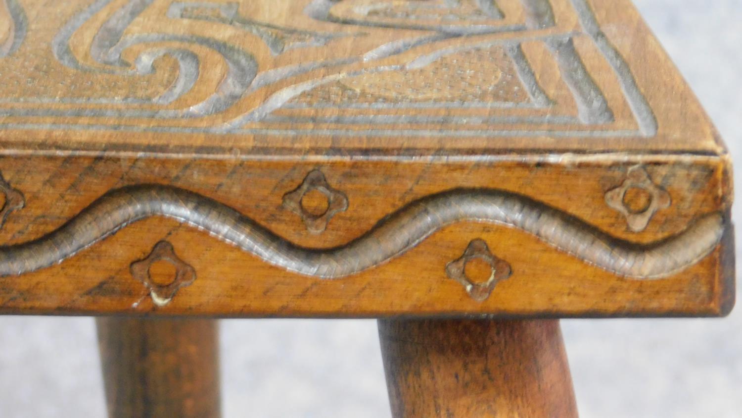 A carved teak spinning chair and a similar footstool. H.79cm (tallest) - Image 5 of 10