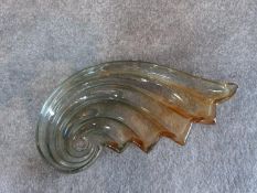 A two colour gradient iridescent glass stylised shell plate. H 48cm.