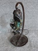 A vintage cast bronze stingray and slag glass mosaic fish desk lamp. H 38.5 cm.