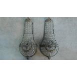 A pair of metal framed basket wall chandeliers. H.50cm