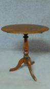 A 19th mahogany oval topped lamp table on turned tripod support. H.73 W.66 D.45cm