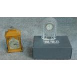 A wooden cased miniature four glass mantel bracket clock by Sewell Ltd. of London and a Waterford