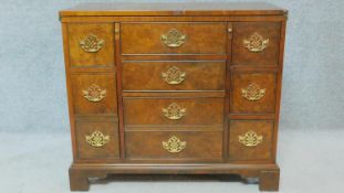 A mid Georgian style burr walnut bachelor's chest with foldover top. H.77 W.87 D.41cm