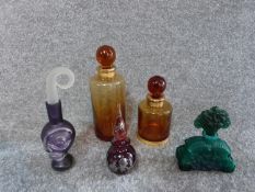 Five glass scent bottles. One by Blowzone, Visage designed by Iestyn Davis with an abstract face,