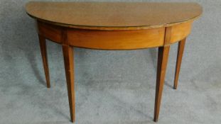 A 19th century satinwood and ebony inlaid console table on square tapering supports. H.72 W.125 D.