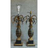 A pair of carved and gilt metal table lamps in the form of pineapples. H.88cm