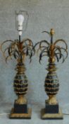 A pair of carved and gilt metal table lamps in the form of pineapples. H.88cm